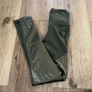 Olive green leggings with shiny front panels